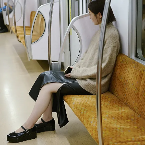 Ballet flats with platforms in black pleated patent